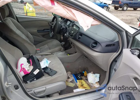 2010 Honda Insight Lx z USA, uszkodzony, nr VIN JHMZE2H56AS040026